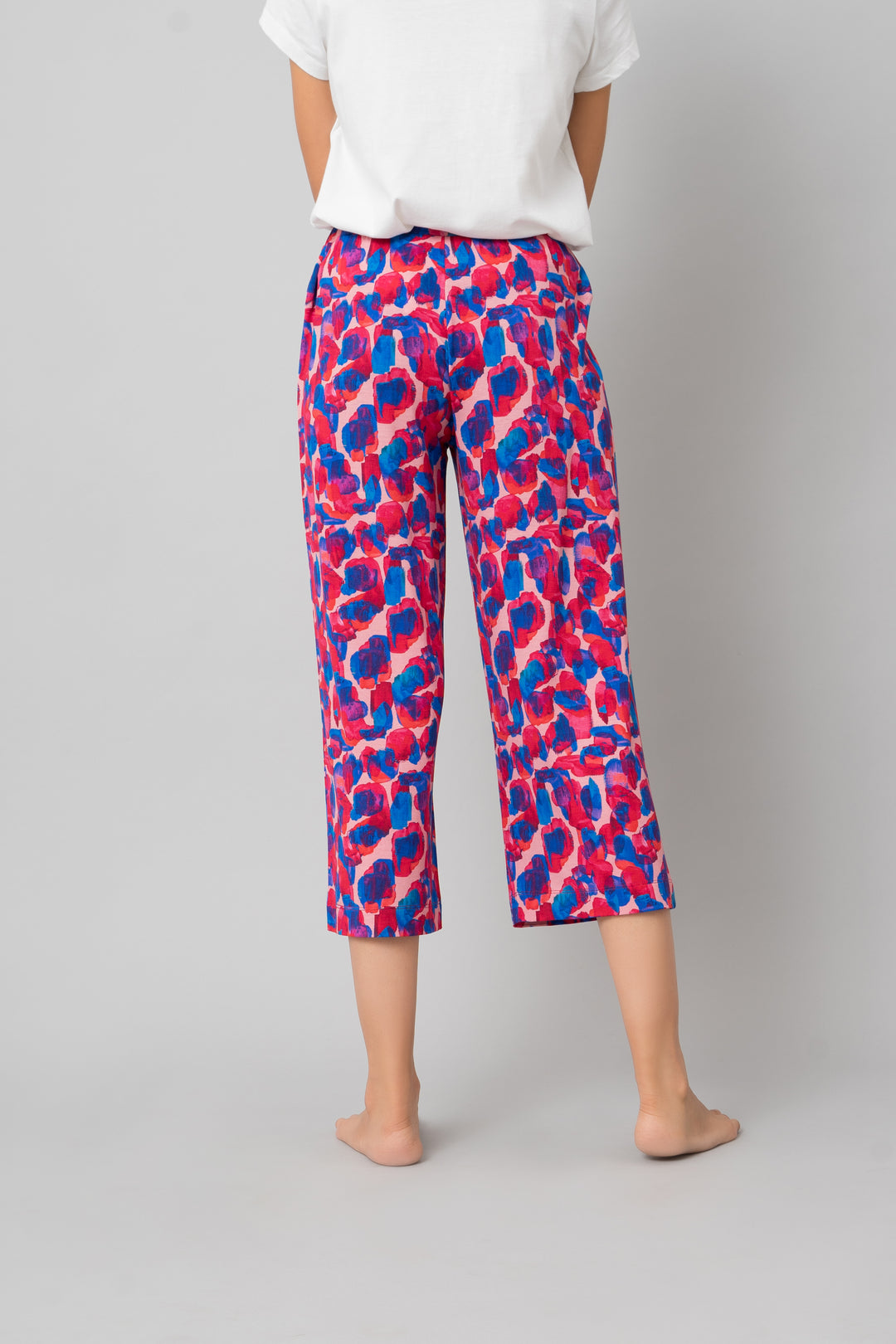 Artsy Watercolor Capri Set in vibrant pink and blue patterns.