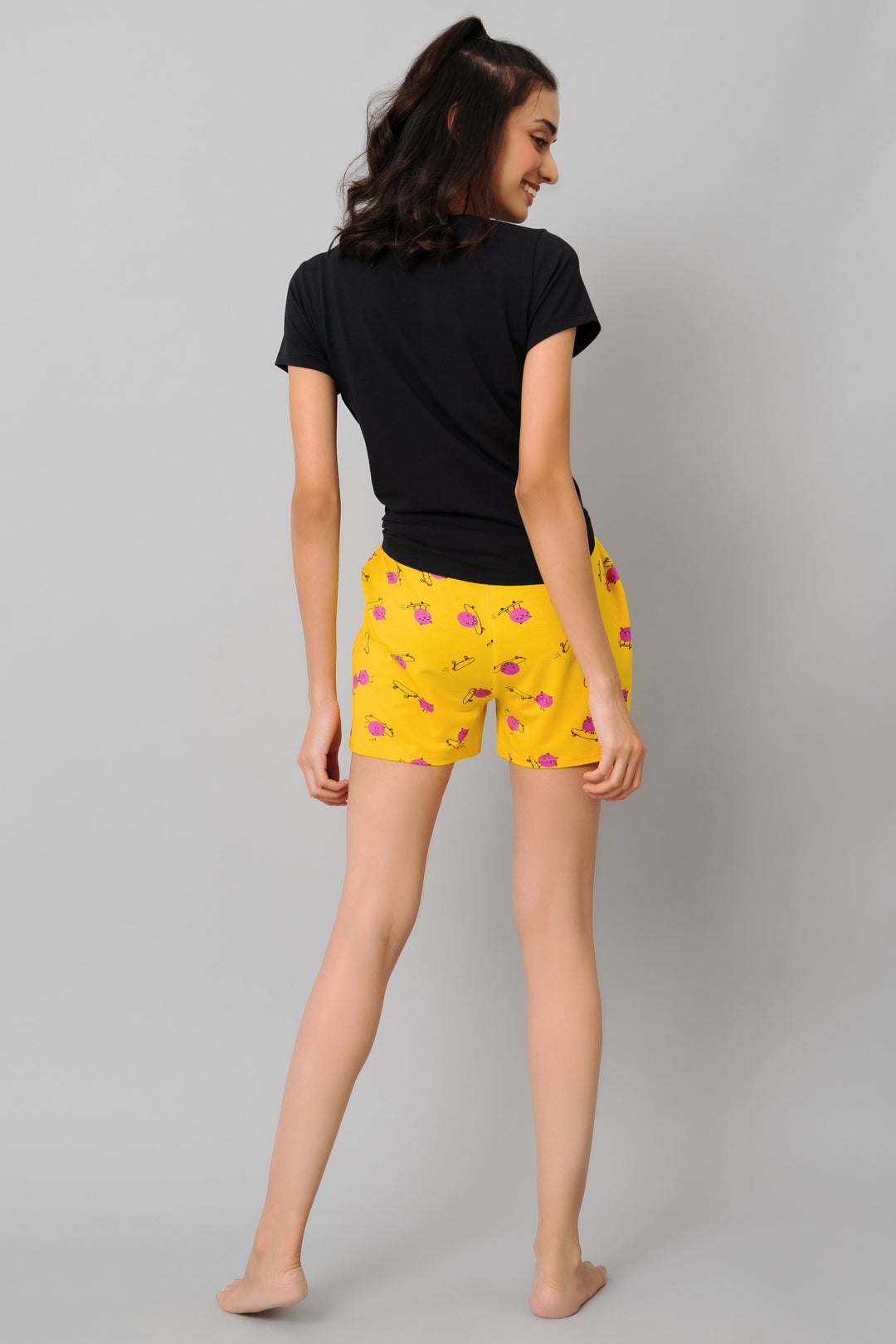 Fuffy Kitty Shorts in vibrant yellow with playful cat print.