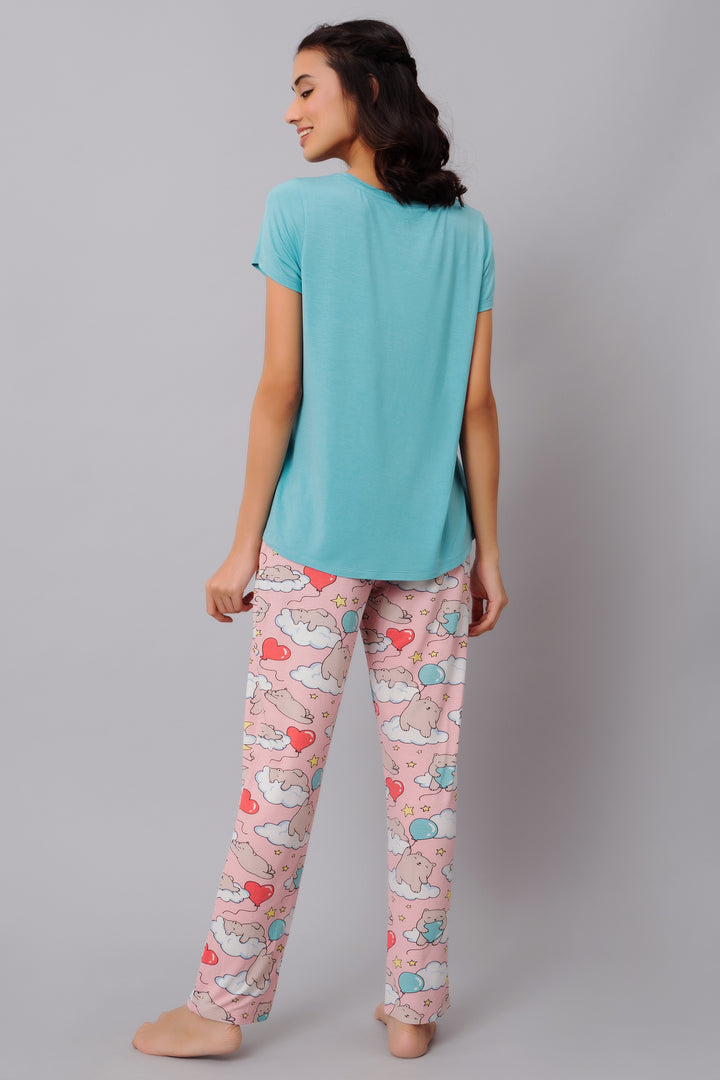 Dreamy Day Pajama Set featuring a blue top and playful printed pants.