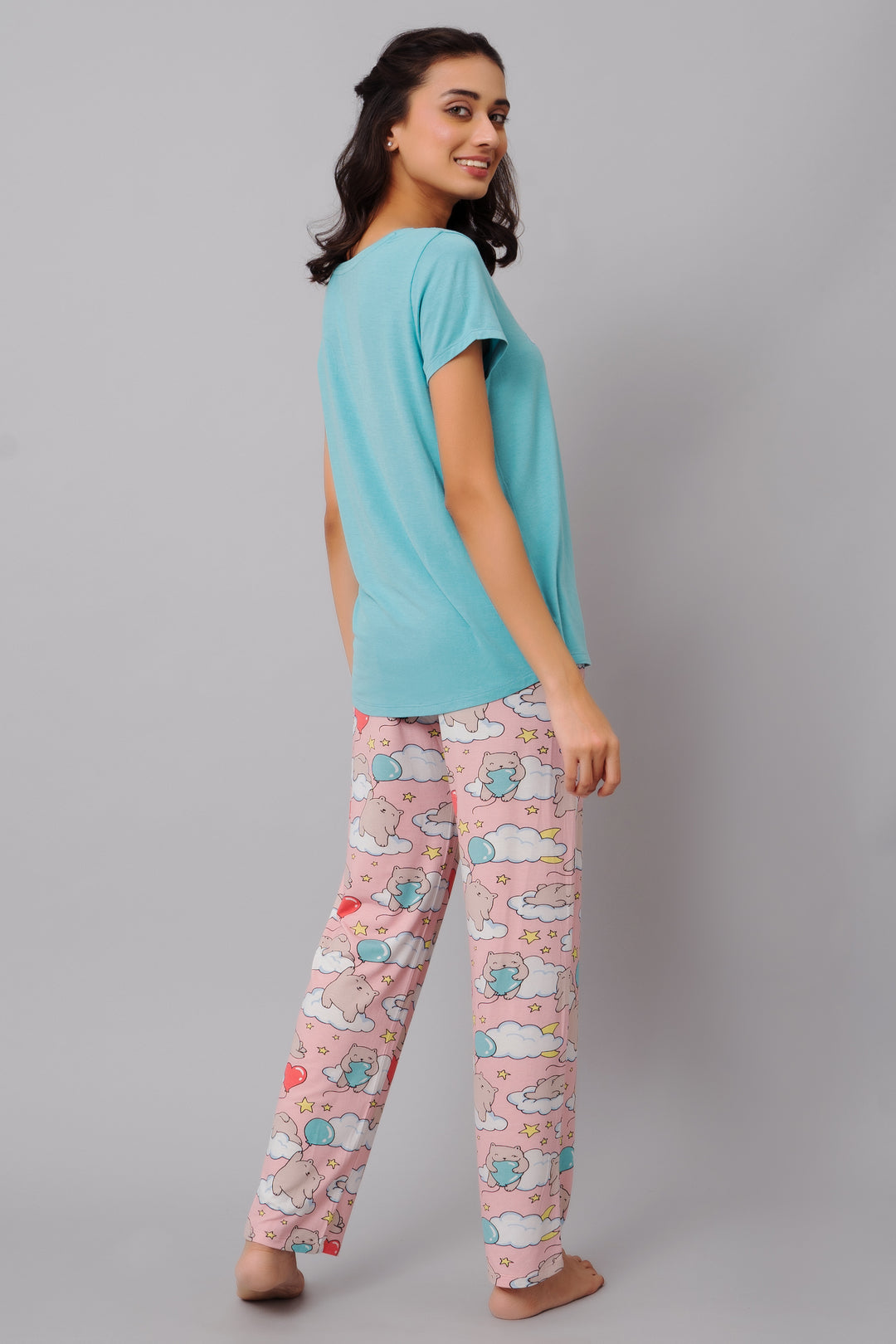 Dreamy Day Pajama Set featuring colorful bear print pants and teal top.