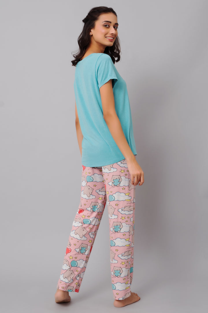 Dreamy Day Pajama Set featuring colorful bear print pants and teal top.
