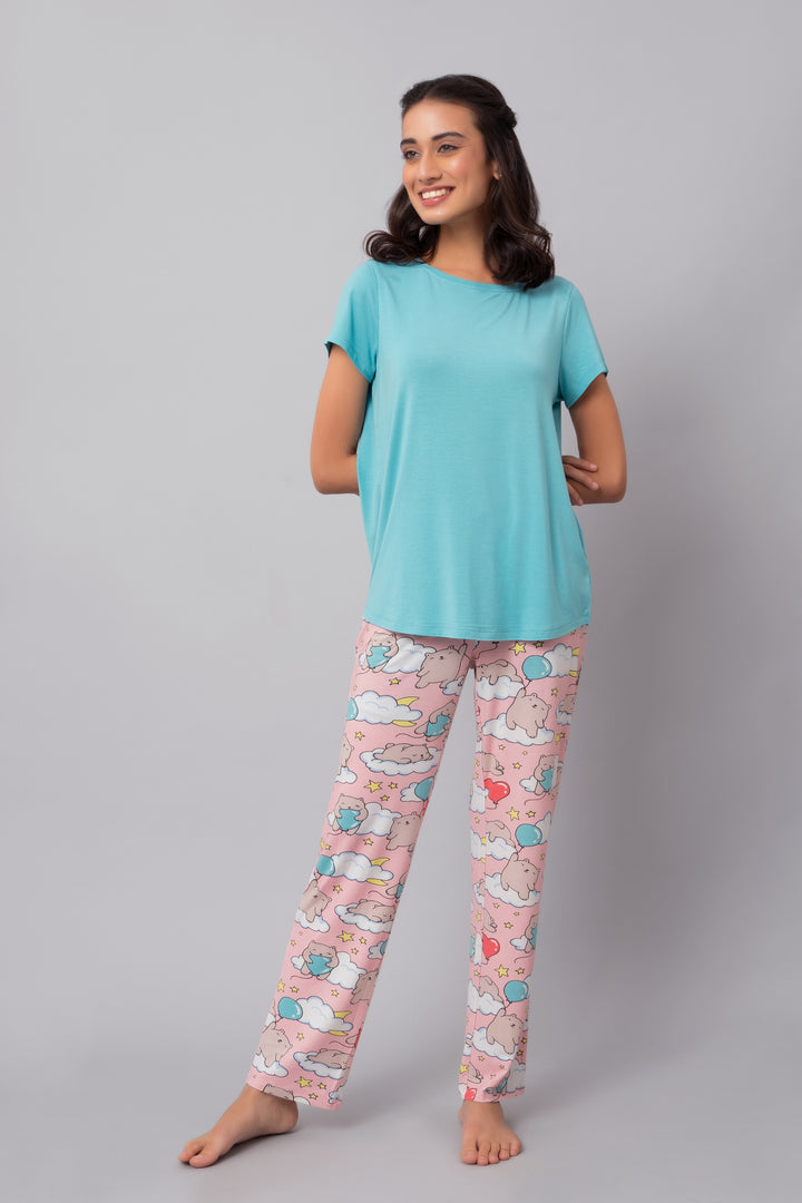 Dreamy Day Pajama Set featuring playful cloud and balloon design.