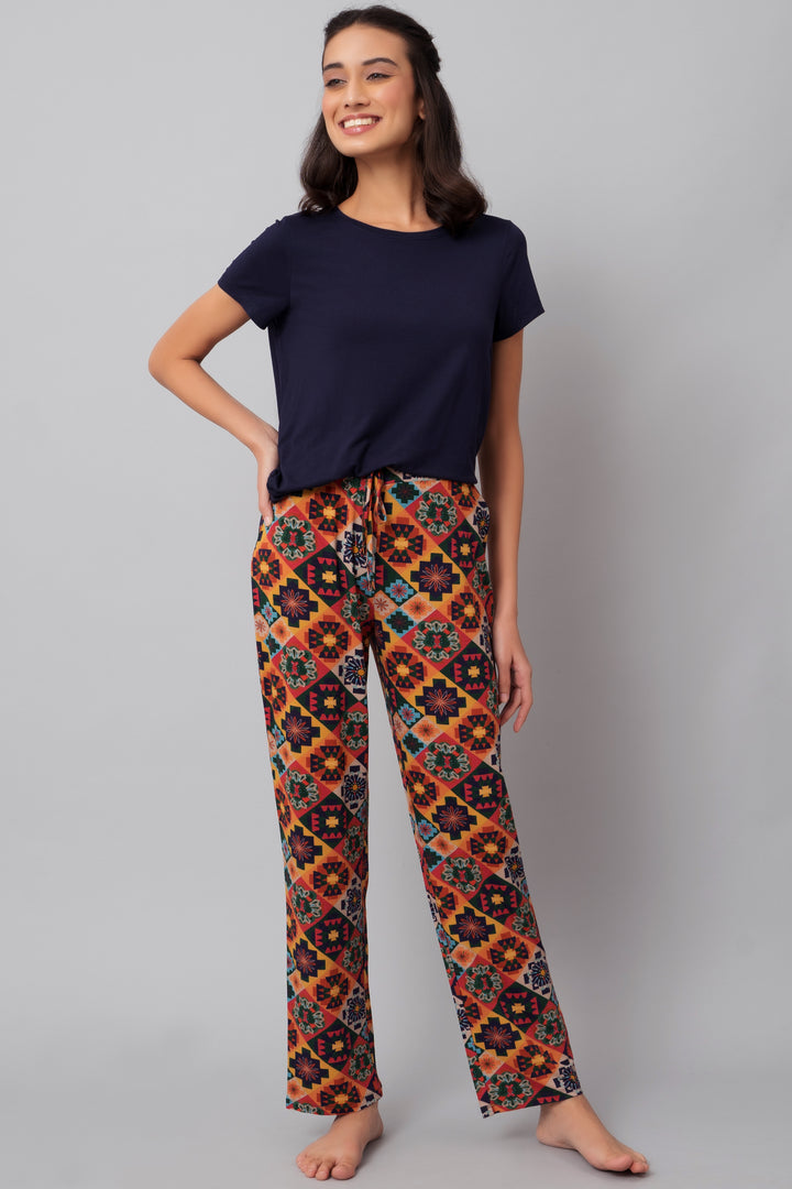 Floral Aztec pajama set with vibrant patterns and relaxed fit.