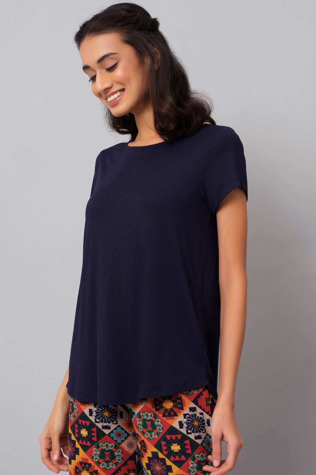 Floral Aztec pajama set with stylish top and patterned bottoms.