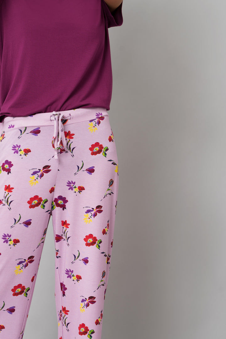 Winter Romance Pajama Set with floral pants and purple top.