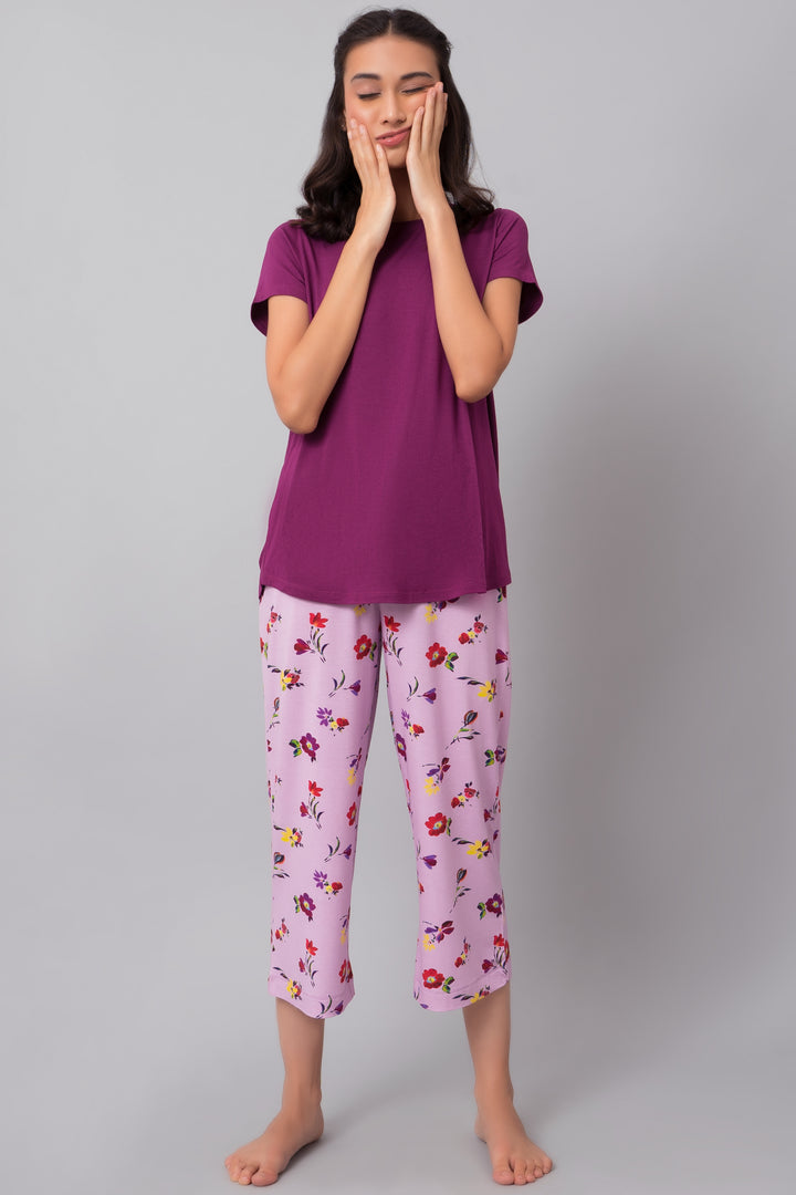 Winter Romance Capri Set featuring a purple top and floral pants.
