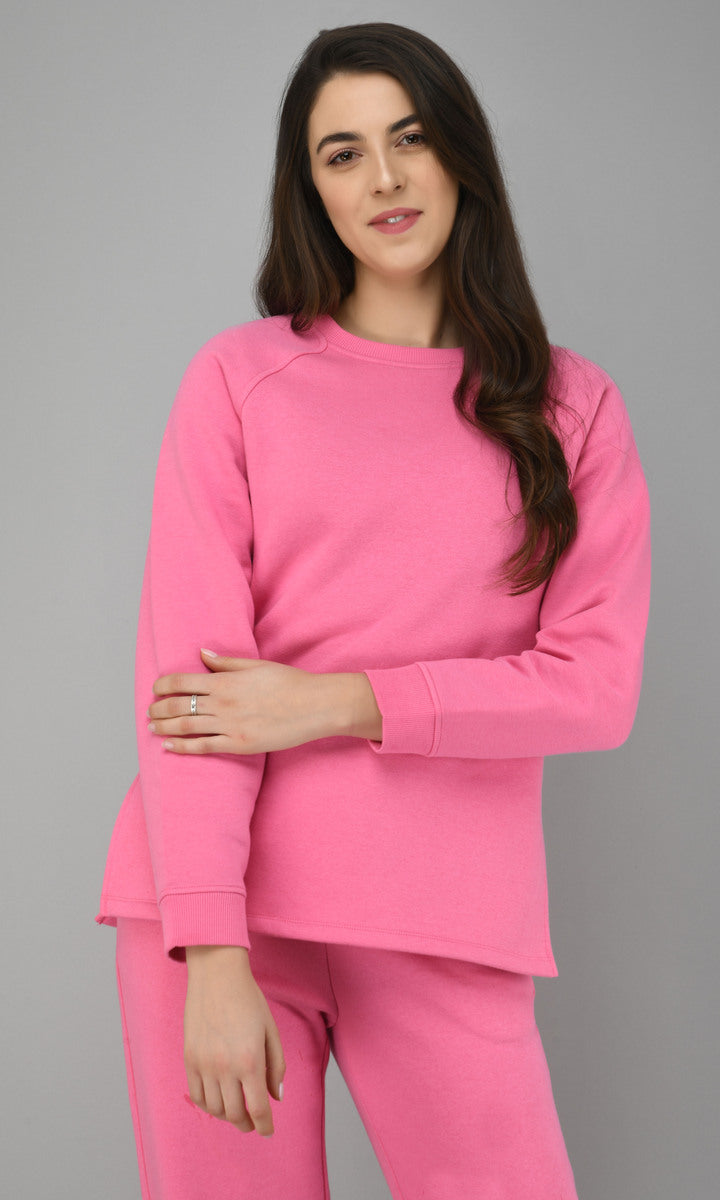 Feisty Pink Fleece Sweatshirt model showcasing stylish pink loungewear.