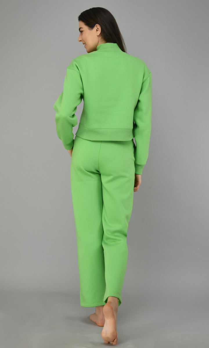 Model wearing Glam Green Fleece Lounge Set, back view.