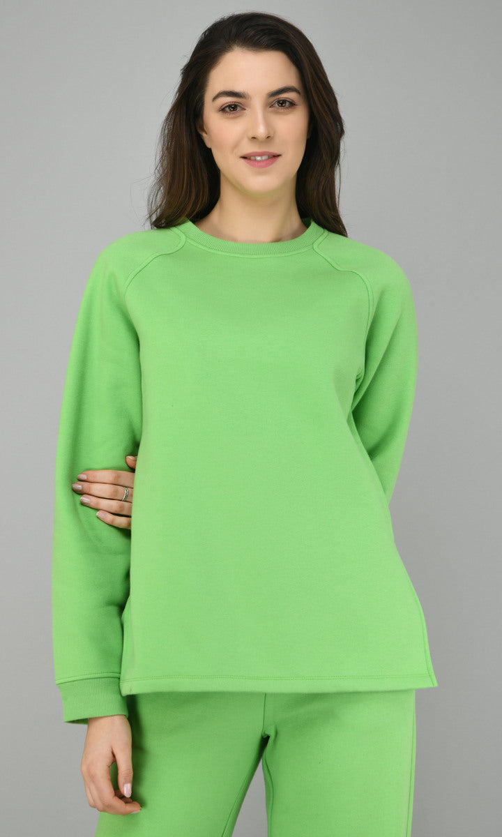 Glam Green Fleece Long Pullover Set model showcasing vibrant outfit.