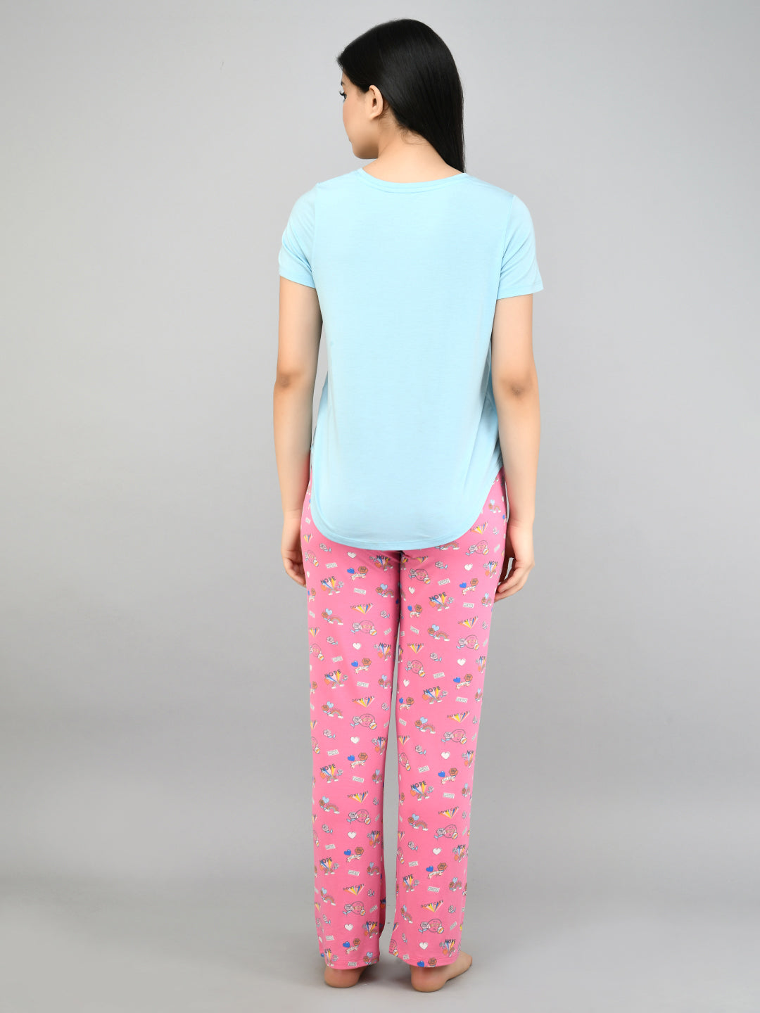 Summer Escape Pajama Set featuring light blue top and playful pink pants.