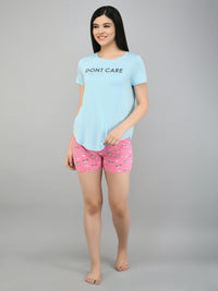 Summer Escape Shorts styled with a casual "Don't Care" t-shirt.