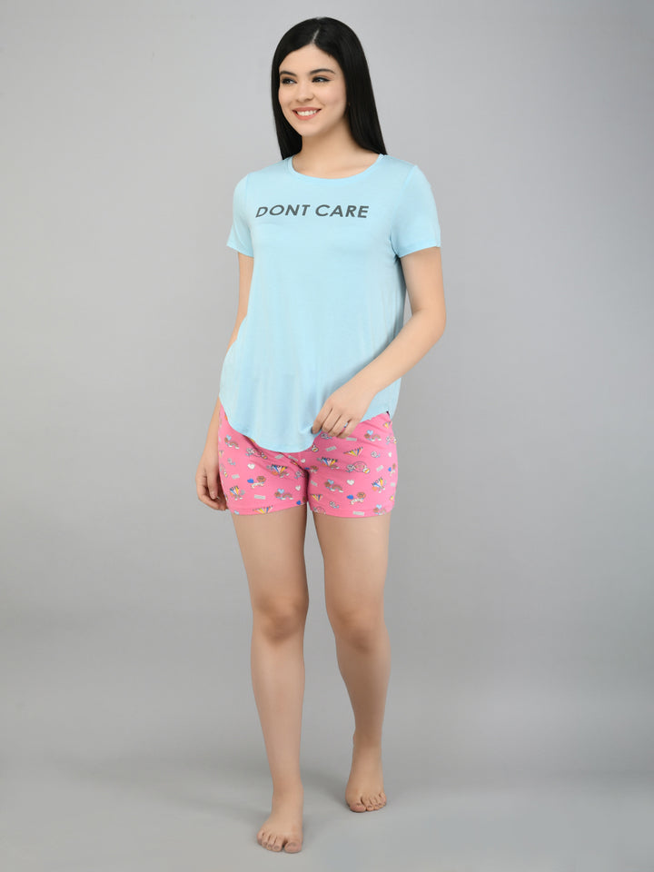 Summer Escape Shorts styled with a casual "Don't Care" t-shirt.