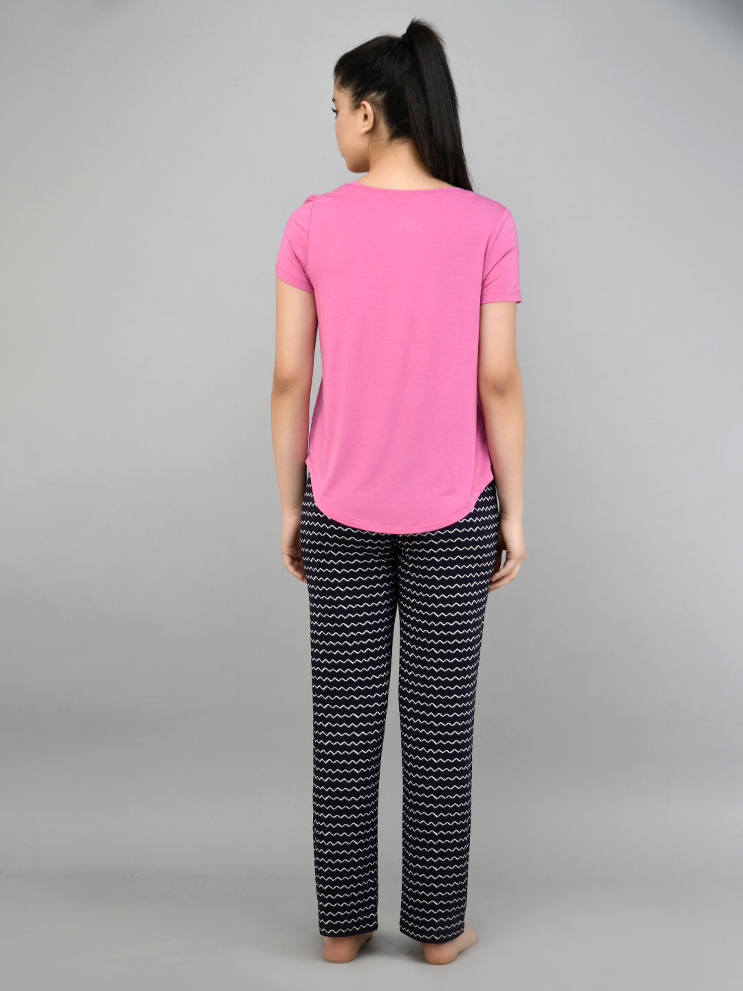 "Hey Siri Pajama Set featuring a pink top and patterned pants."