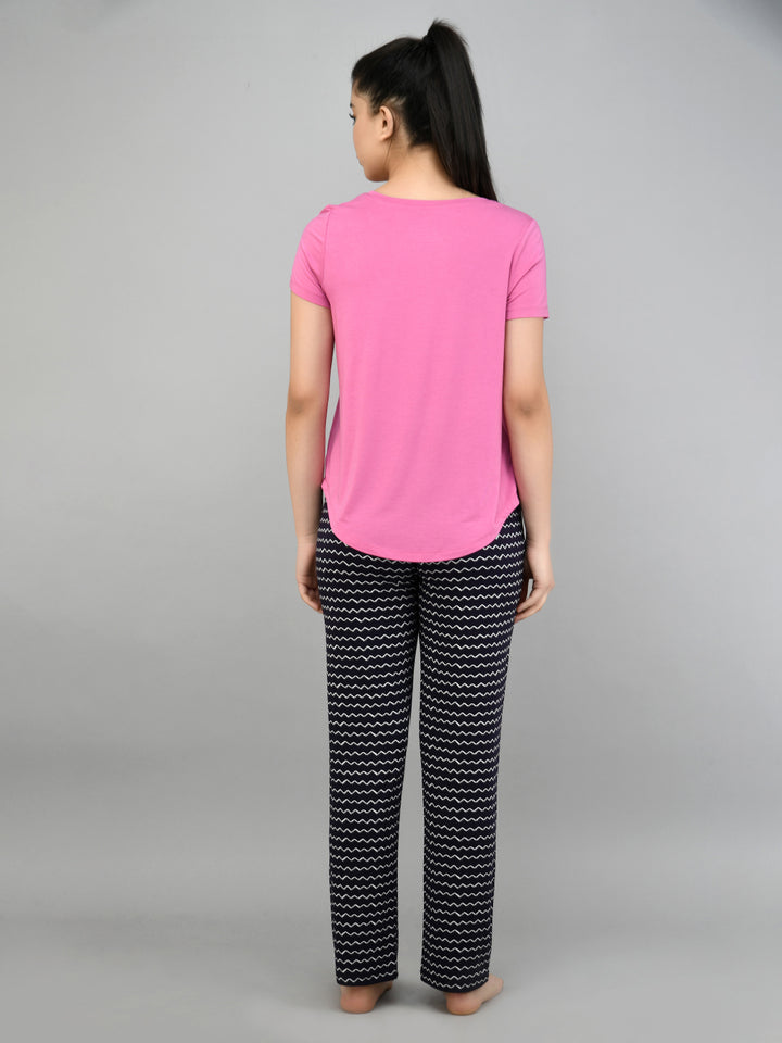 "Hey Siri Pajama Set featuring a pink top and patterned pants."