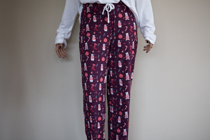 Frosty Christmas Pajama Set with festive patterns and cozy fit.