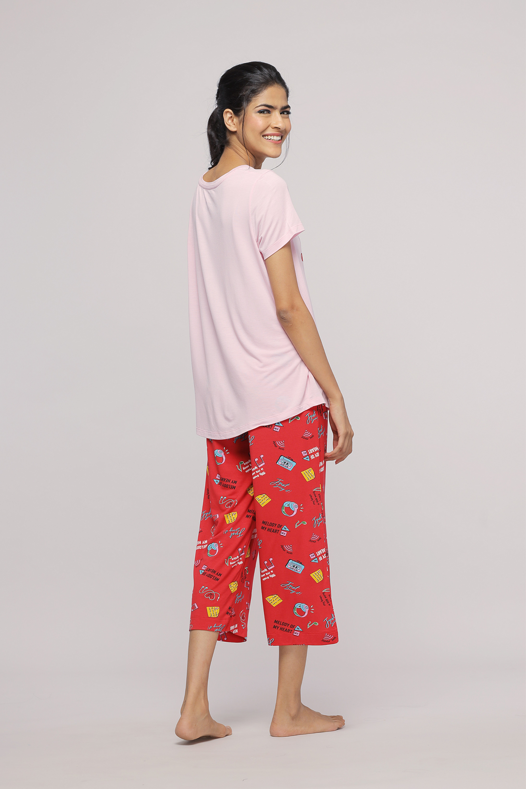 Model showcasing Music In My Heart Capri pajama set.