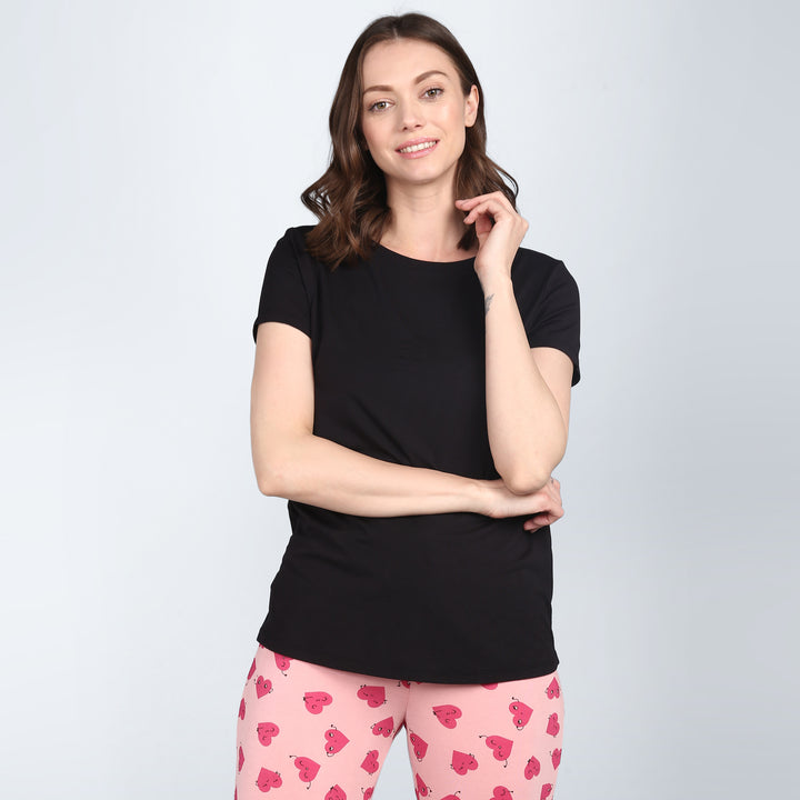 Everyday Black Pajama Set model showcasing comfortable styling and relaxation.
