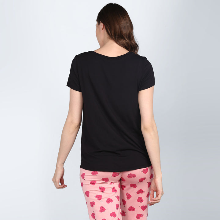 Everyday Black Pajama Set with short sleeve top and playful pants.