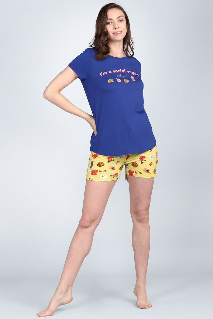 Social Vegan Shorts Set featuring playful food graphics on yellow shorts.