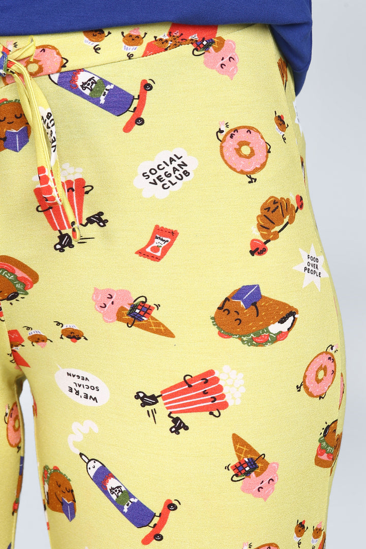 Colorful vegan-themed shorts set with playful food graphics.