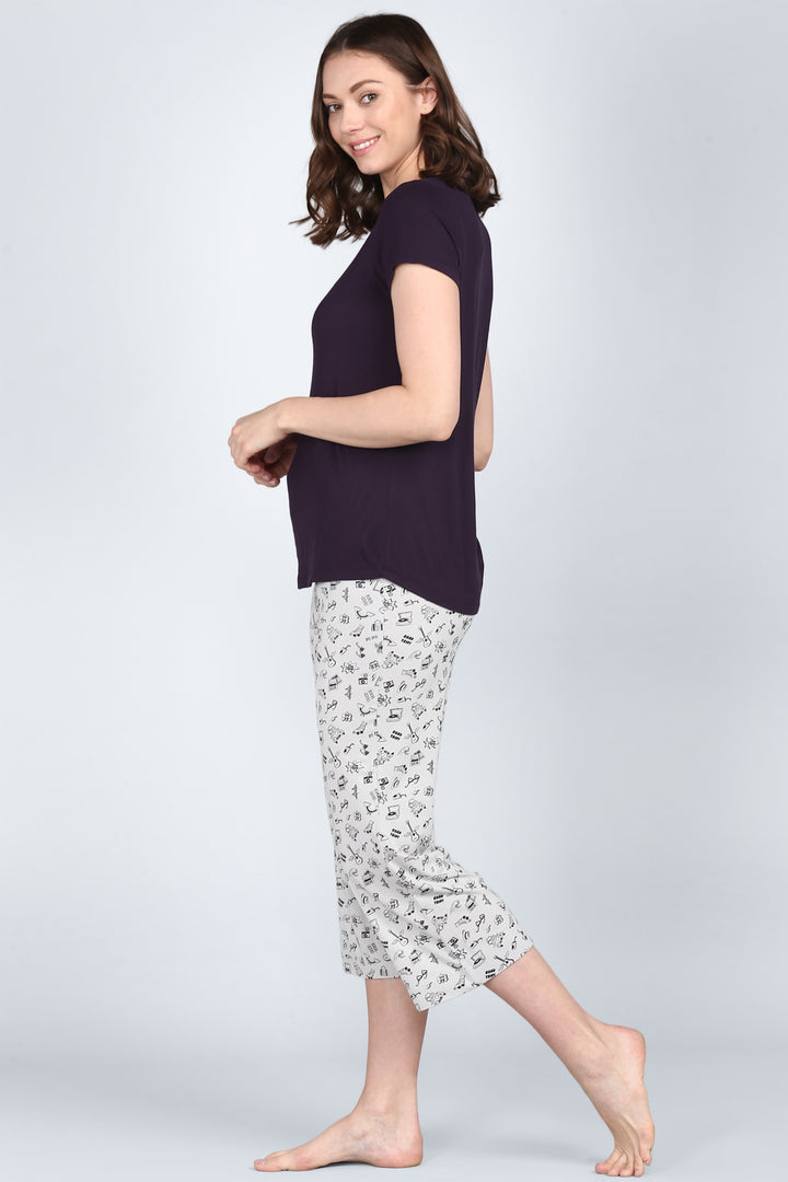 Bon Voyage Capri Set featuring stylish top and patterned capri pants.