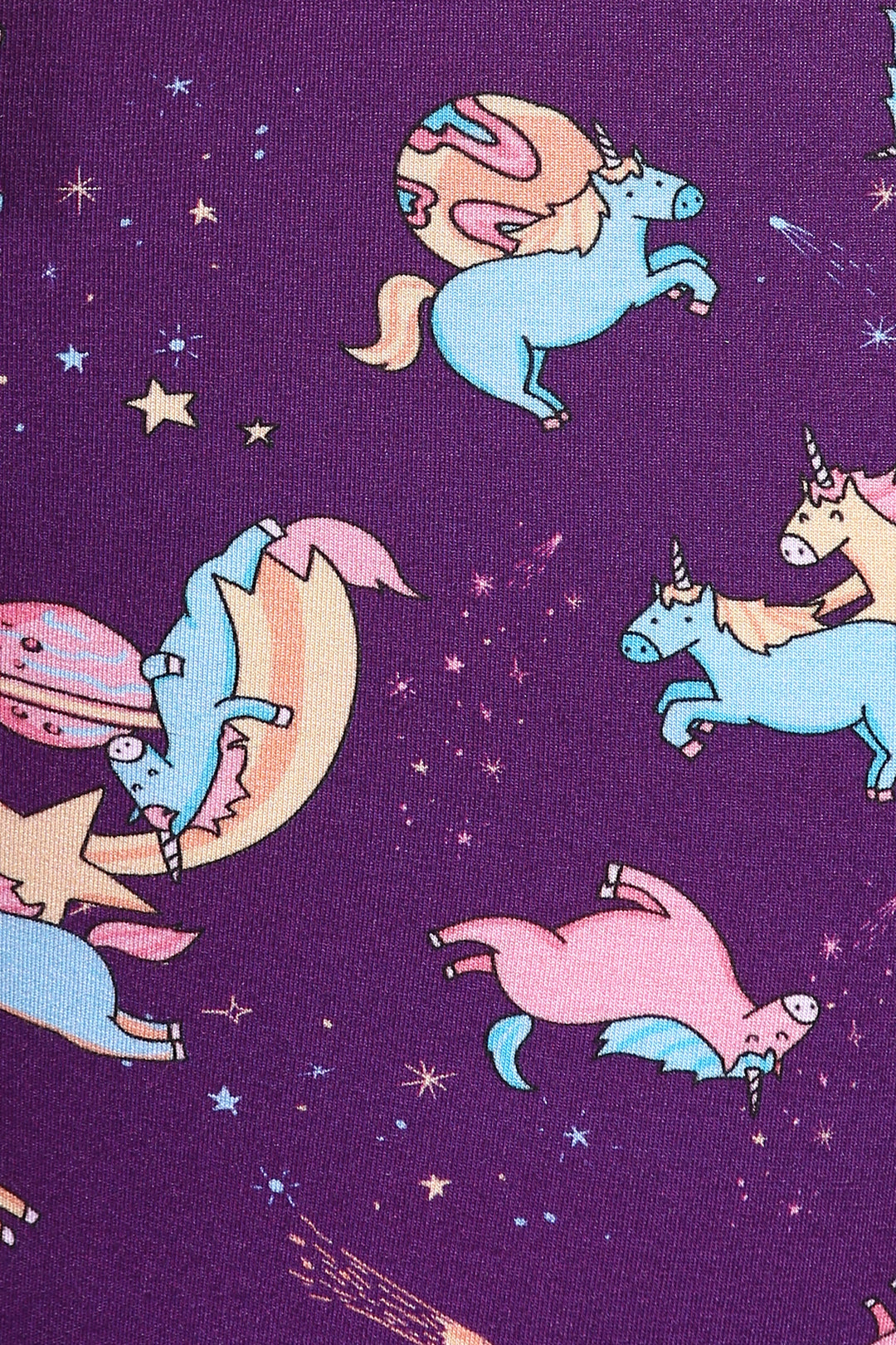 Spaced Out Unicorns pattern on purple shorts set fabric.