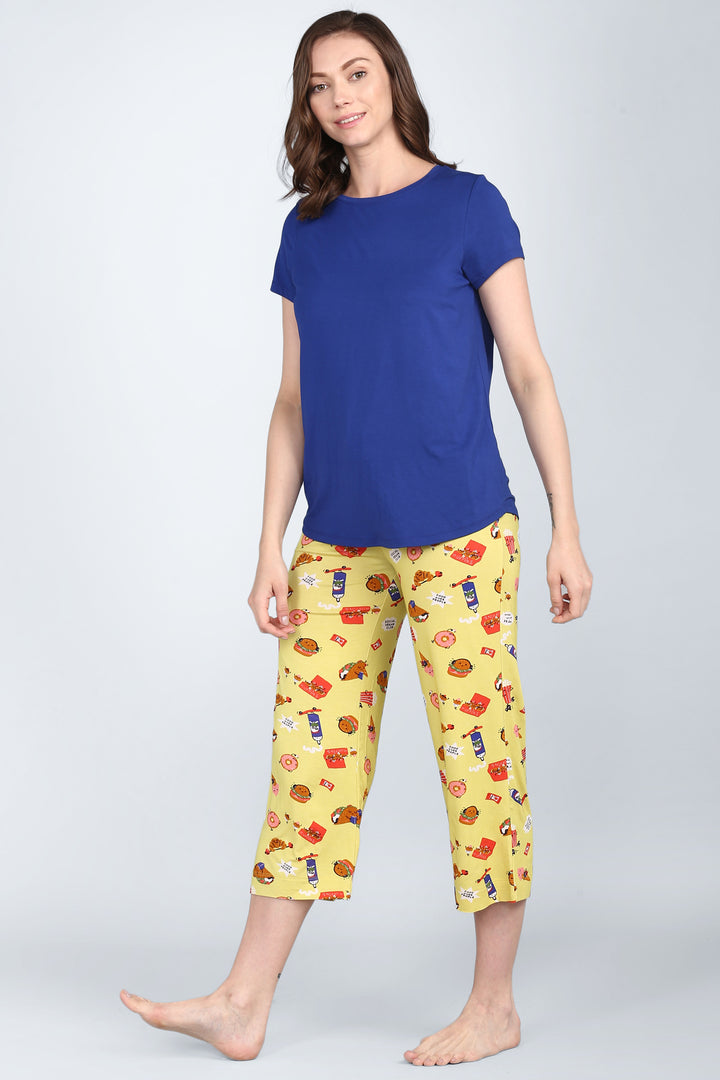 Snuggle Blue Capri Set model showcasing vibrant pajamas and comfortable top.