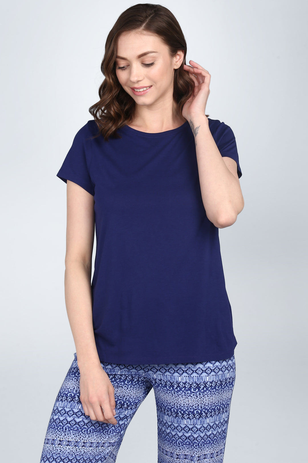 Blue Tiger Capri Set featuring a stylish navy top and patterned bottoms.