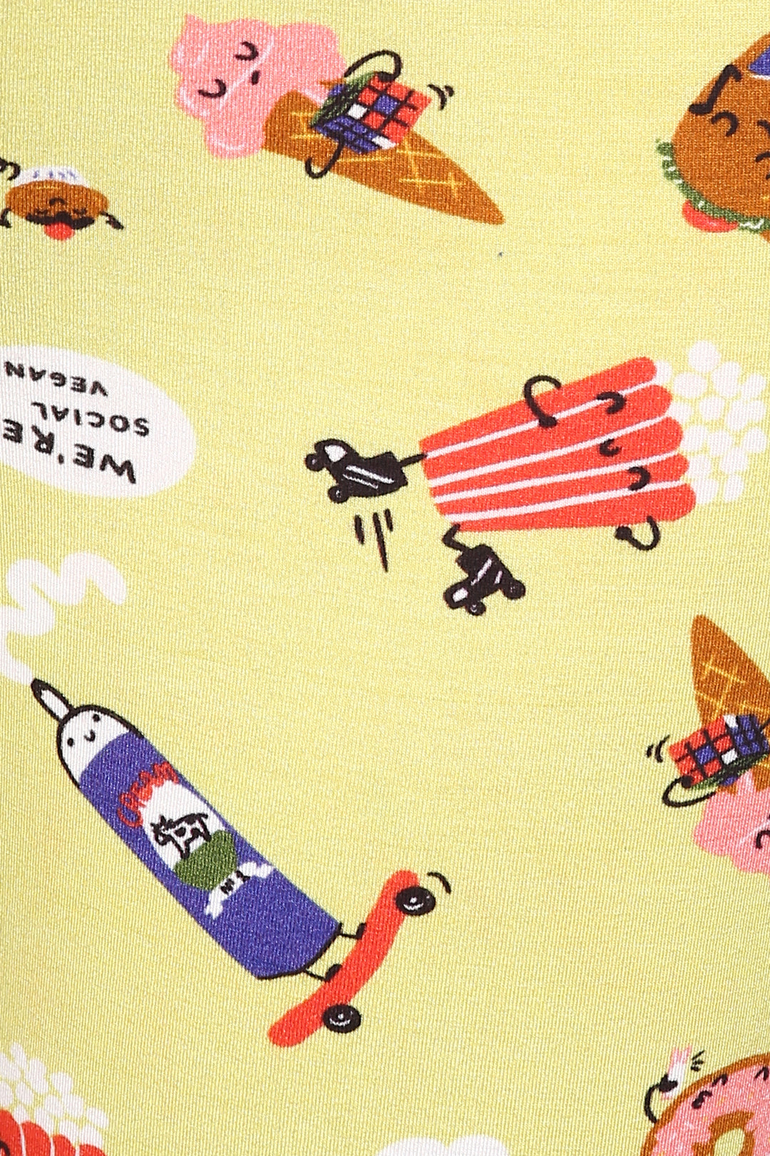 Colorful patterned fabric featuring fun food characters for Snuggle Blue Shorts Set.