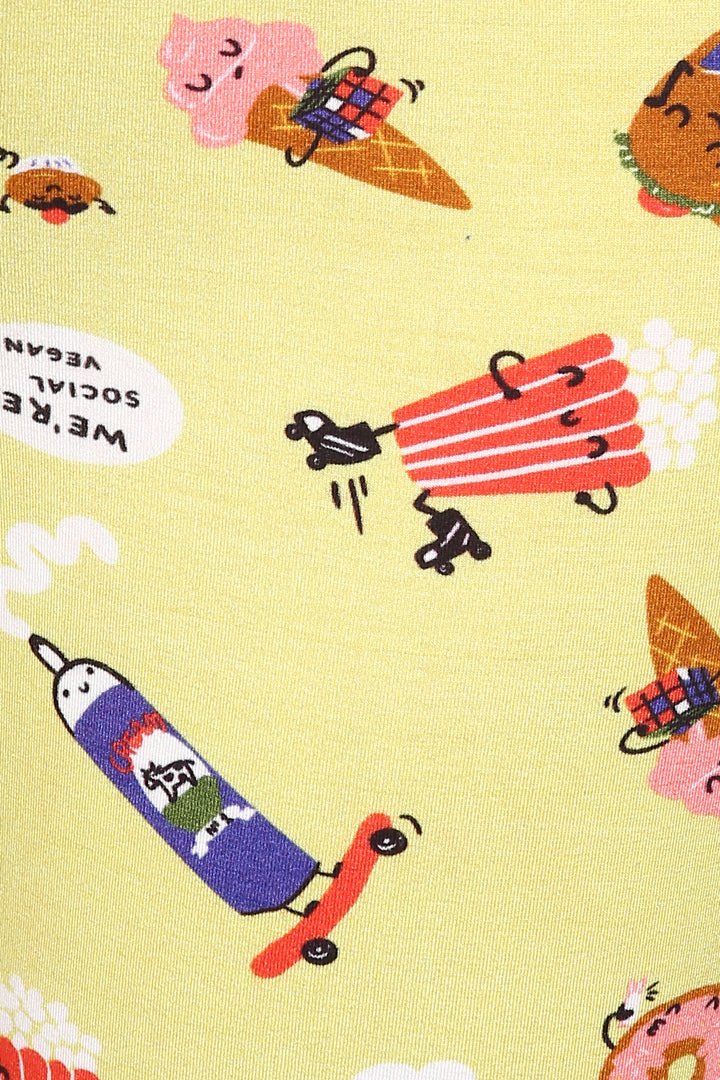 Colorful patterned fabric featuring fun food characters for Snuggle Blue Shorts Set.