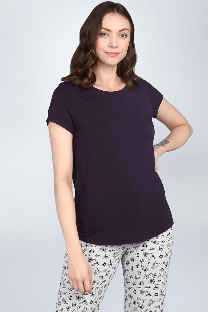 Stylish model wearing Love Sleep Blue Top, perfect for relaxation.