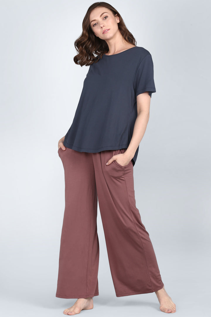 Rose taupe lounge set featuring a relaxed top and wide-leg pants.