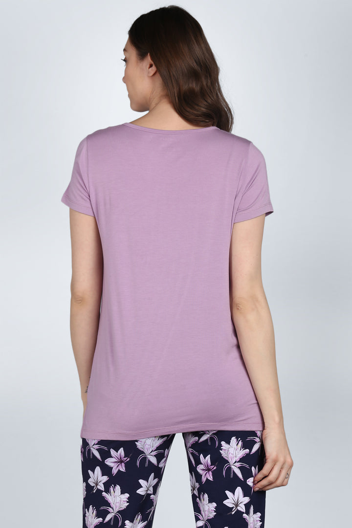 Back view of Lavender Sparkle Pajama Set with floral pants.
