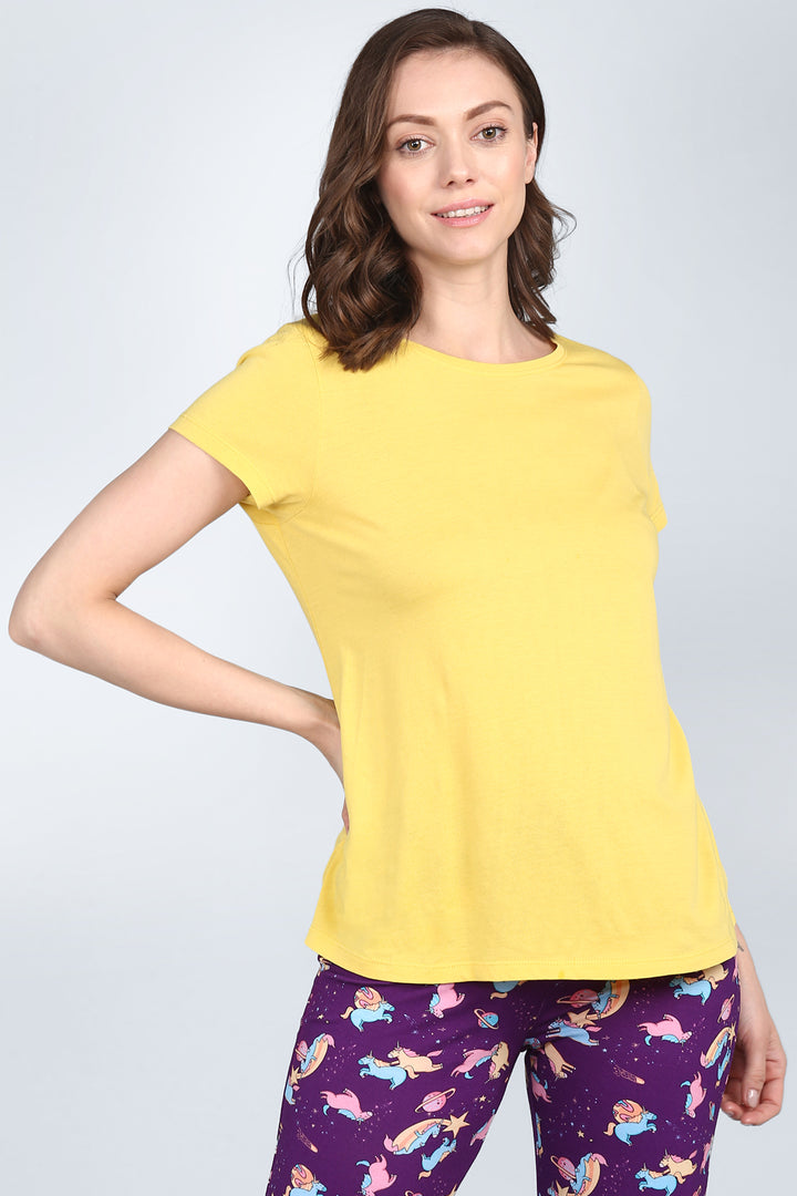 Mellow Yellow Pajama Set featuring a yellow shirt and unicorn leggings.