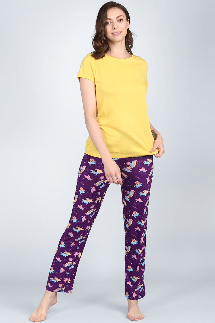 Mellow Yellow Pajama Set featuring a bright yellow top and colorful patterned pants.