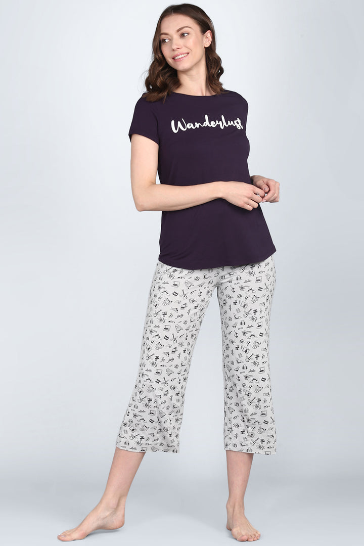 Bon Voyage Capri Set featuring 'Wanderlust' top and travel-themed pajama pants.