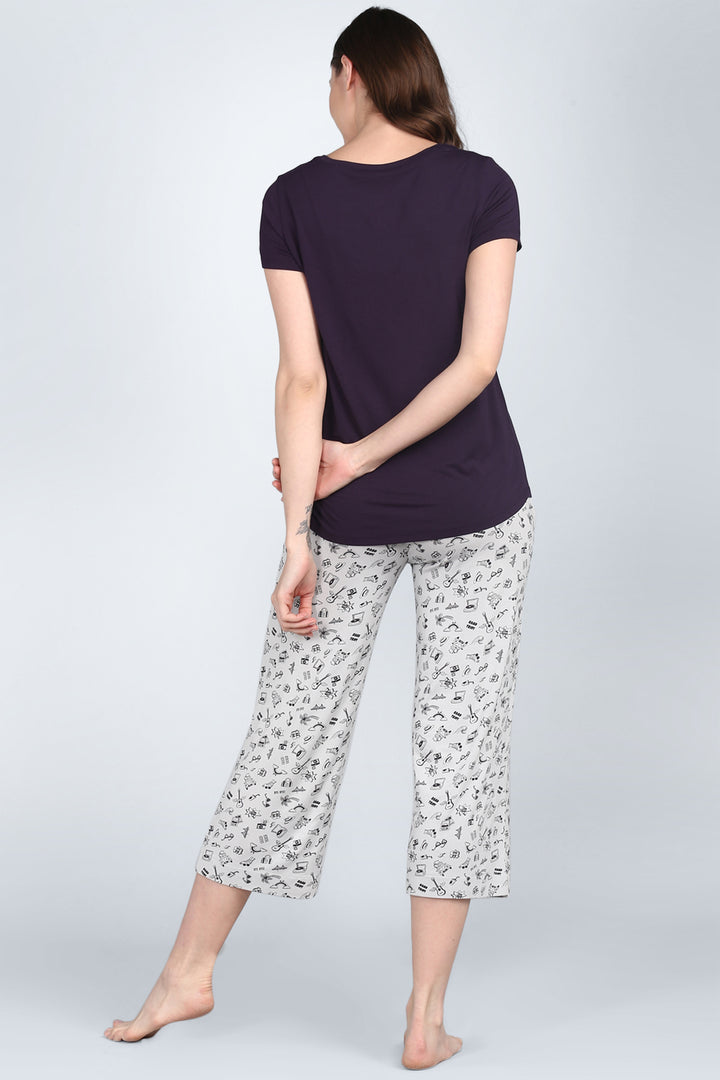 Bon Voyage Capri Set featuring a stylish top and patterned capri pants.