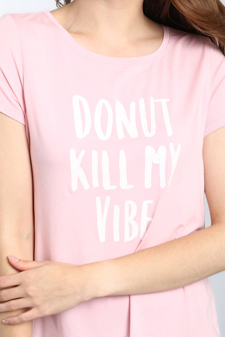Pink graphic t-shirt with "Donut Kill My Vibe" slogan.