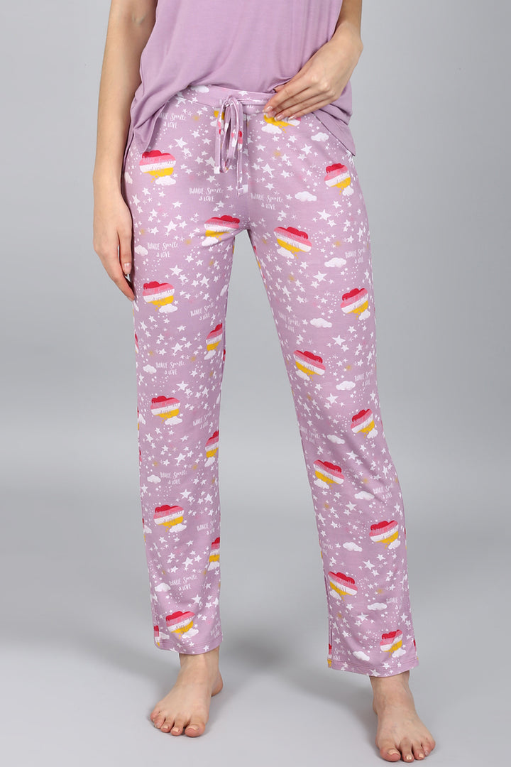 Day Dream Sparkle Pajamas featuring colorful cupcake and star patterns.