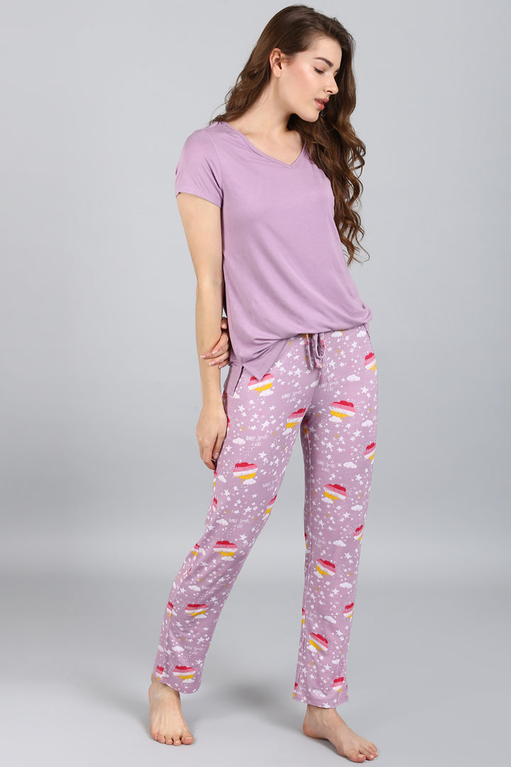 Day Dream Sparkle Pajamas featuring playful cupcake and star designs.