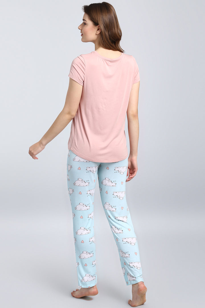 Puppy Love Pajamas: cute pink top with playful patterned pants.