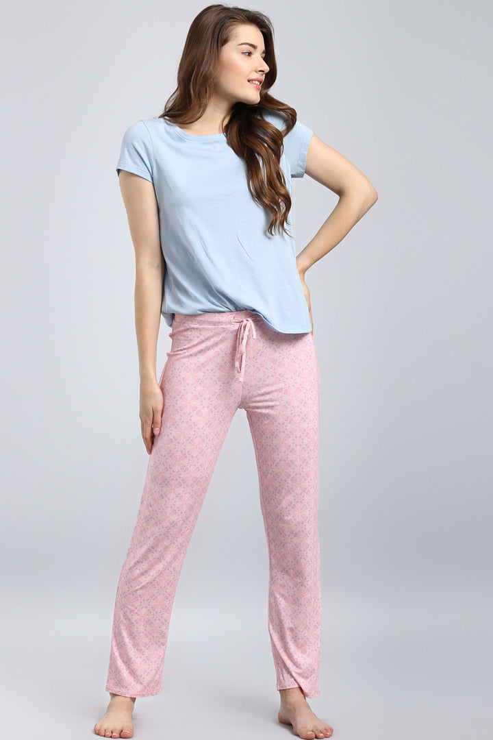 Blush pattern pajama set featuring a comfortable blue top and floral pants.
