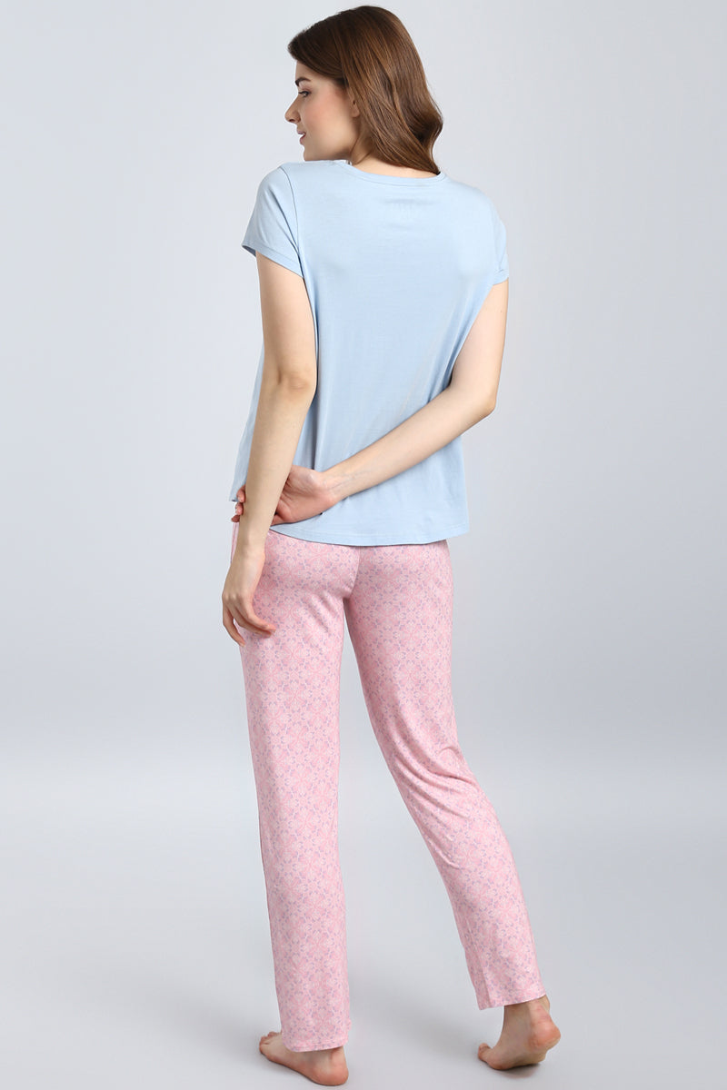 Blush Pattern Pajama set featuring light blue top and pink patterned pants.