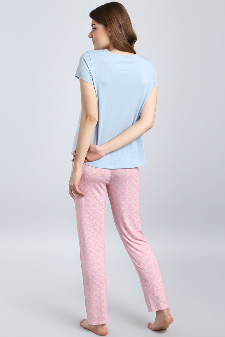 Blush Pattern Pajama set featuring light blue top and pink patterned pants.