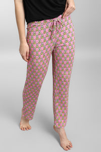 Tropical Vacay Pajamas with pineapple pattern in pink fabric.