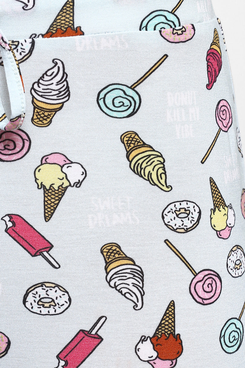 Fun pastel pajama set with donuts and ice cream patterns.