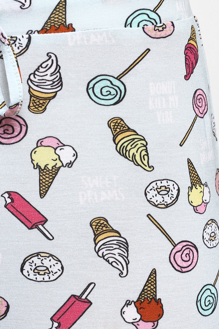 Fun pastel pajama set with donuts and ice cream patterns.