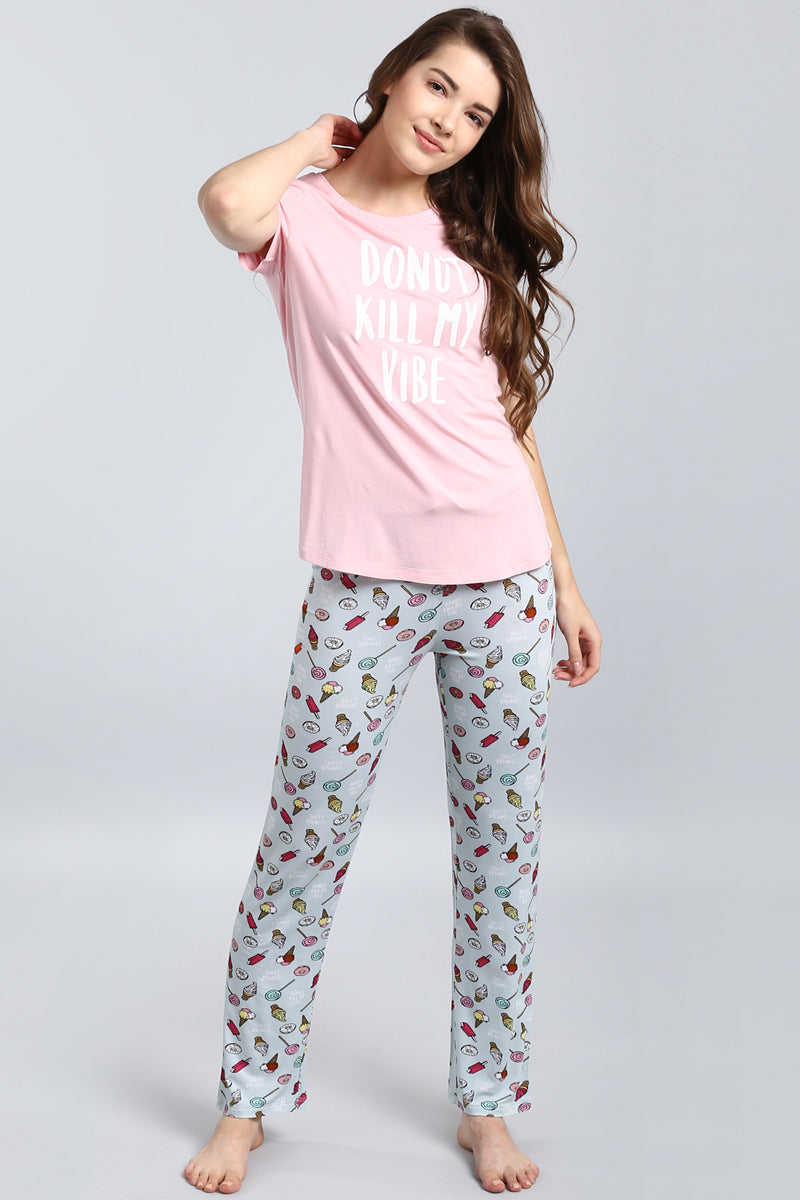 Dreamer Pajamas set featuring playful donut-themed design and comfy fit.