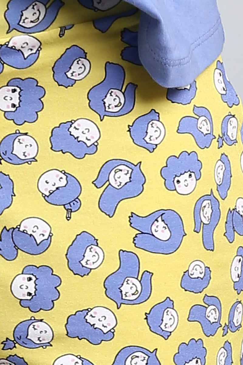Happy Girl Shorts featuring colorful cartoon faces on yellow fabric.