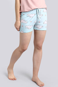 Puppy Love Shorts with playful dog illustrations on light blue fabric.